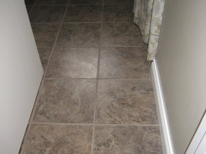 New tile floor, included new sub-floor, and baseboard. Bathroom was also painted.